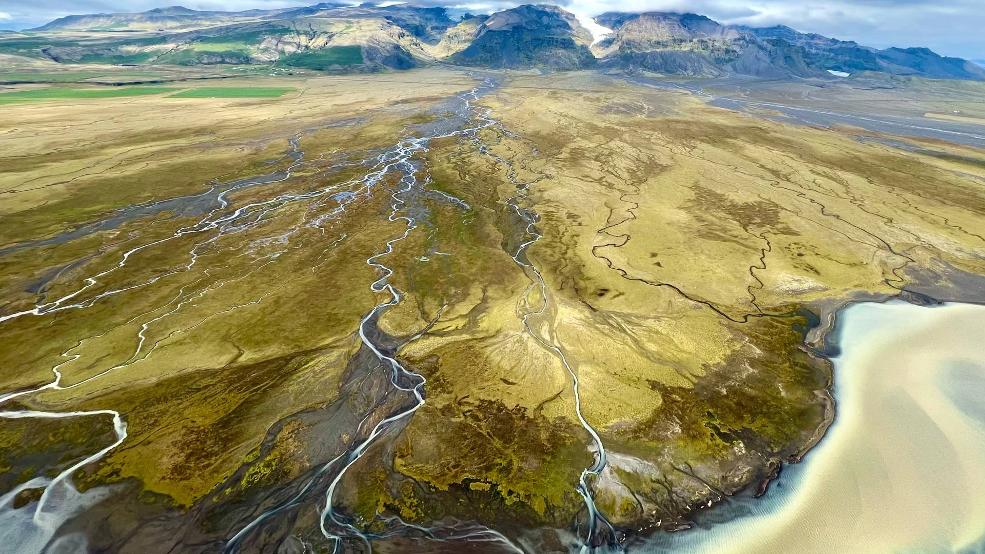 Aerial shot of the glacial rivers in southern Iceland.