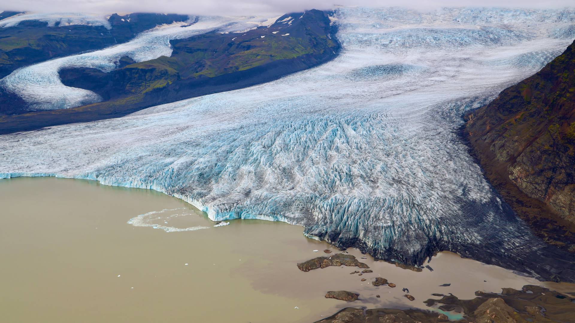 An icelandic glacial tongue feeding into its meltwater