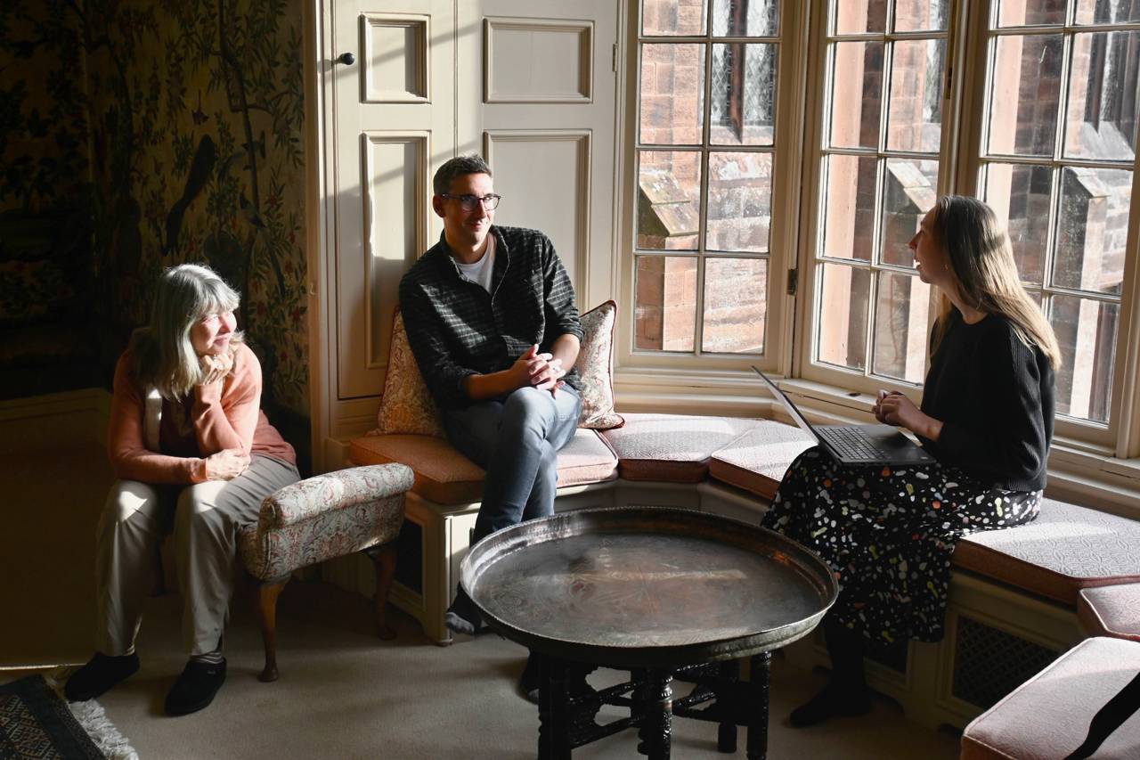  Alison Boden (left), dean of religious life and the Chapel at Princeton, and Rose Castle Foundation staff members Robbie Leigh and Phoebe Dill review an exercise shortly before it begins during the 2023 trip. 