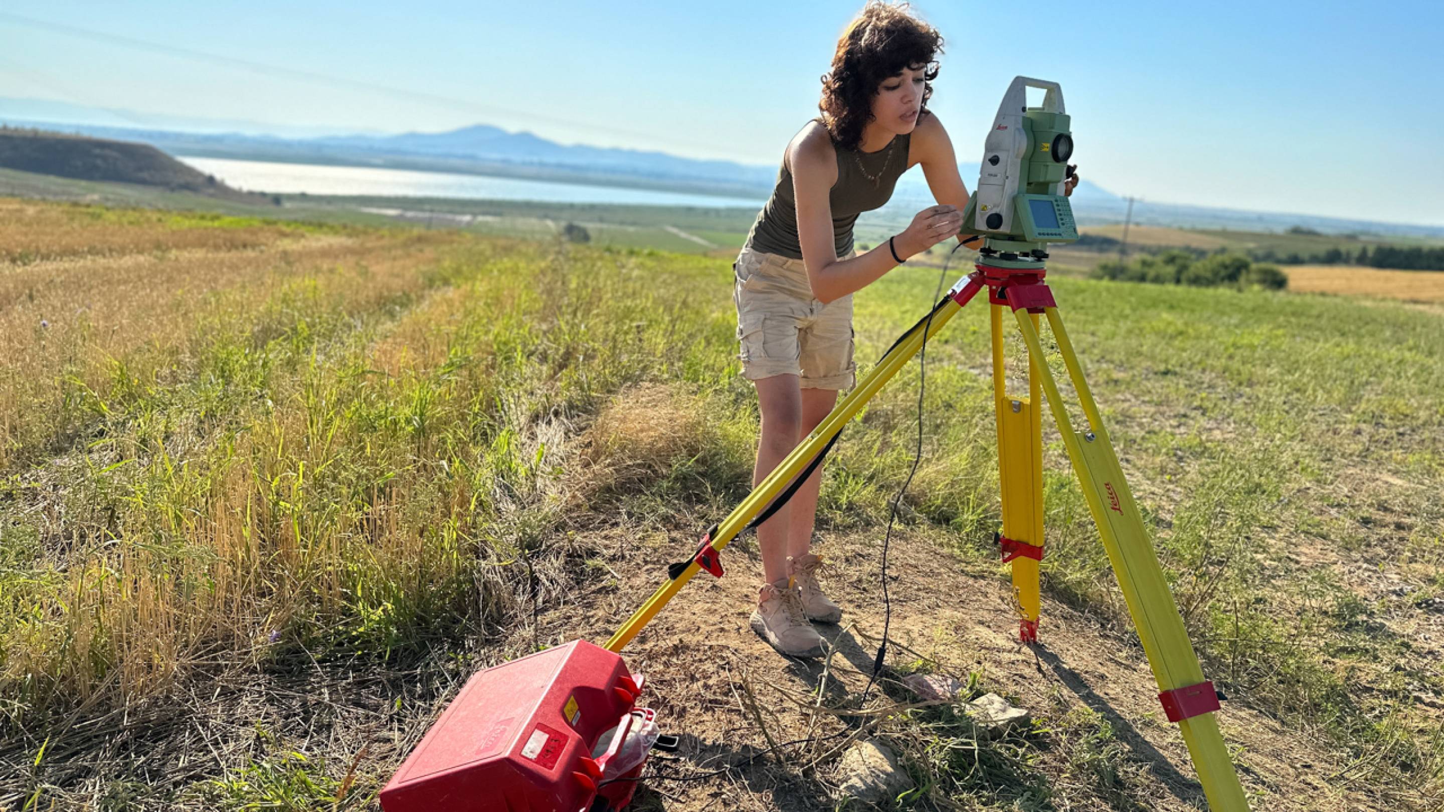 Grace Fausett ’25 measures coordinates of a discovery at the Molyvoti, Thrace