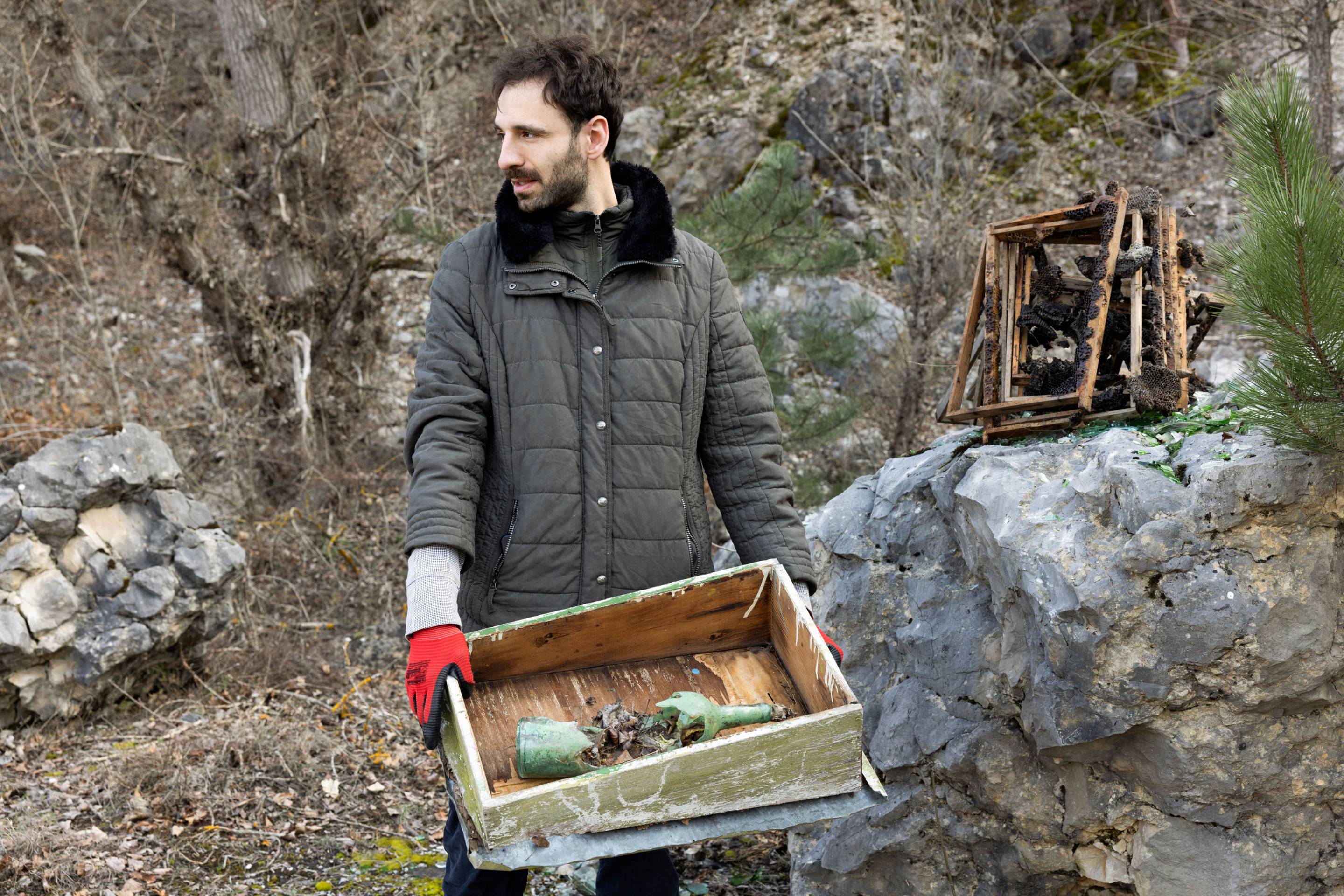 Julian Chehirian collects found objects at former labor camp in Lovech, Bulgaria.