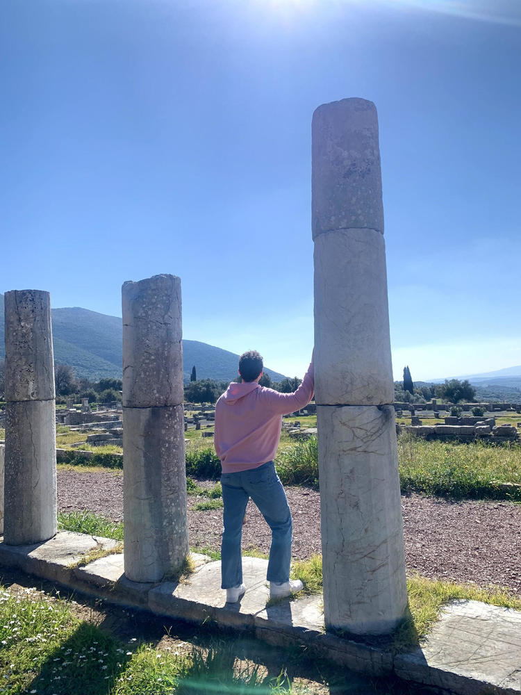 John Freeman standing next to the Messene Archaeological Park