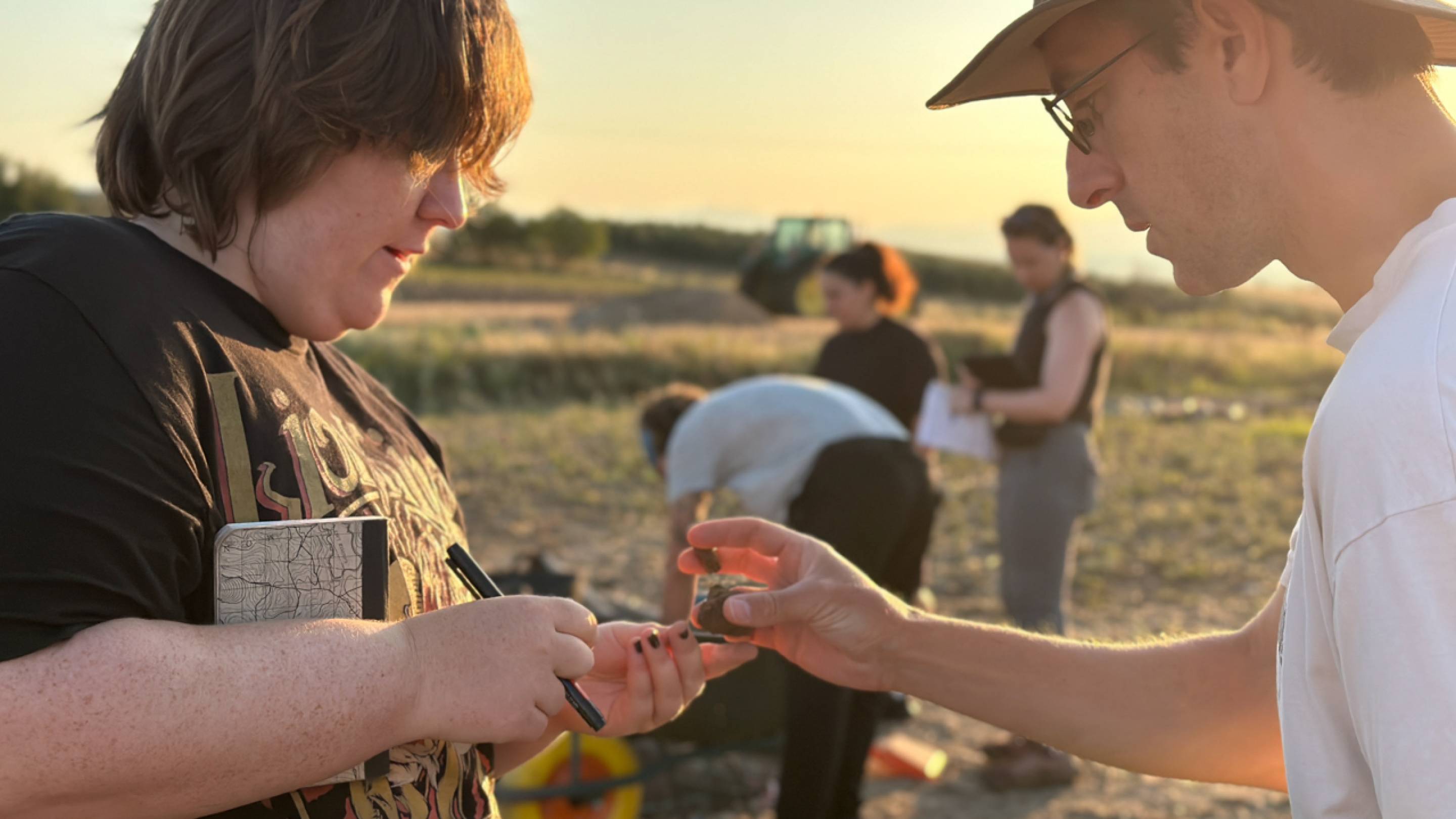 Molly Schaub (left), a graduate student in classical studies at the University of Pennsylvania and an excavation supervisor, confers with Princeton professor Nathan Arrington at the Molyvoti, Thrace.