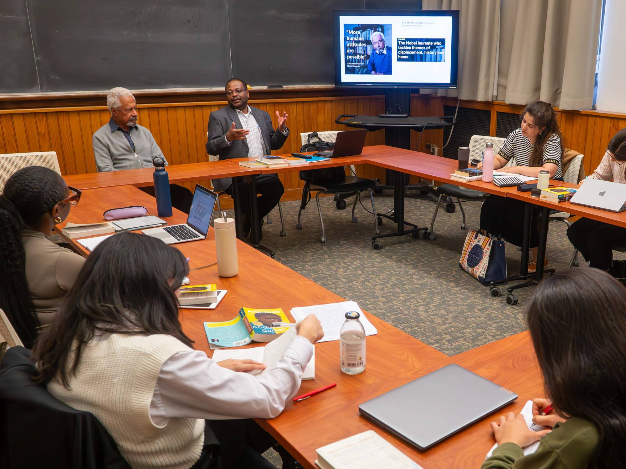 An image of Gurnah speaking to the Gikandi graduate seminar