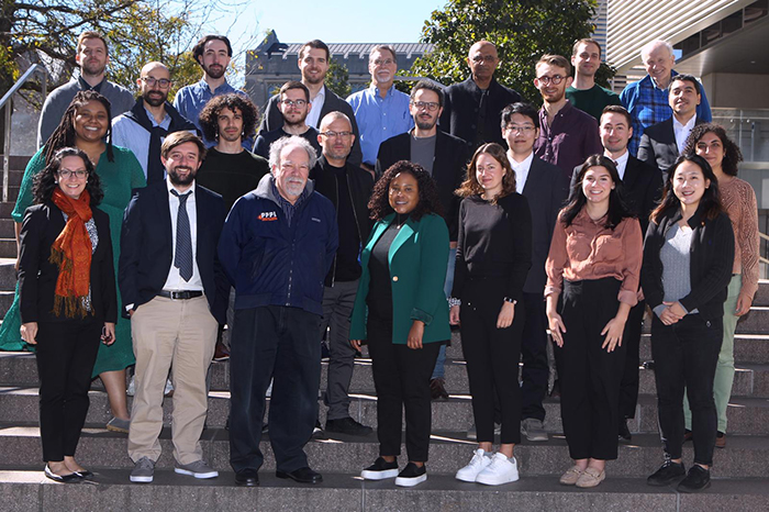 Group of about 20 students and researchers