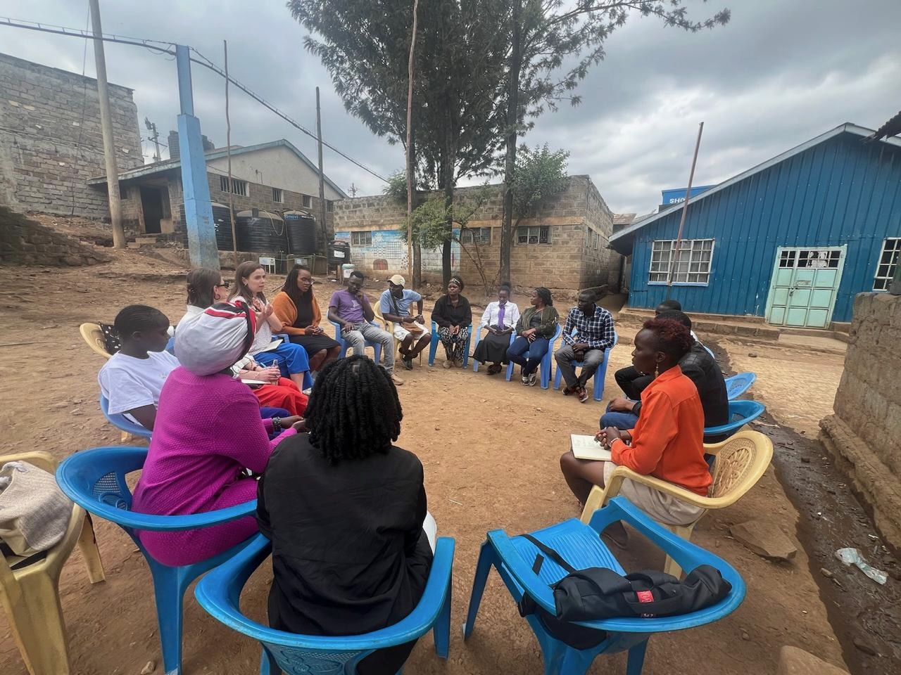 Researchers hold a community meeting and training in Nairobi, Kenya, 