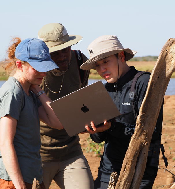 Researchers looking a computer