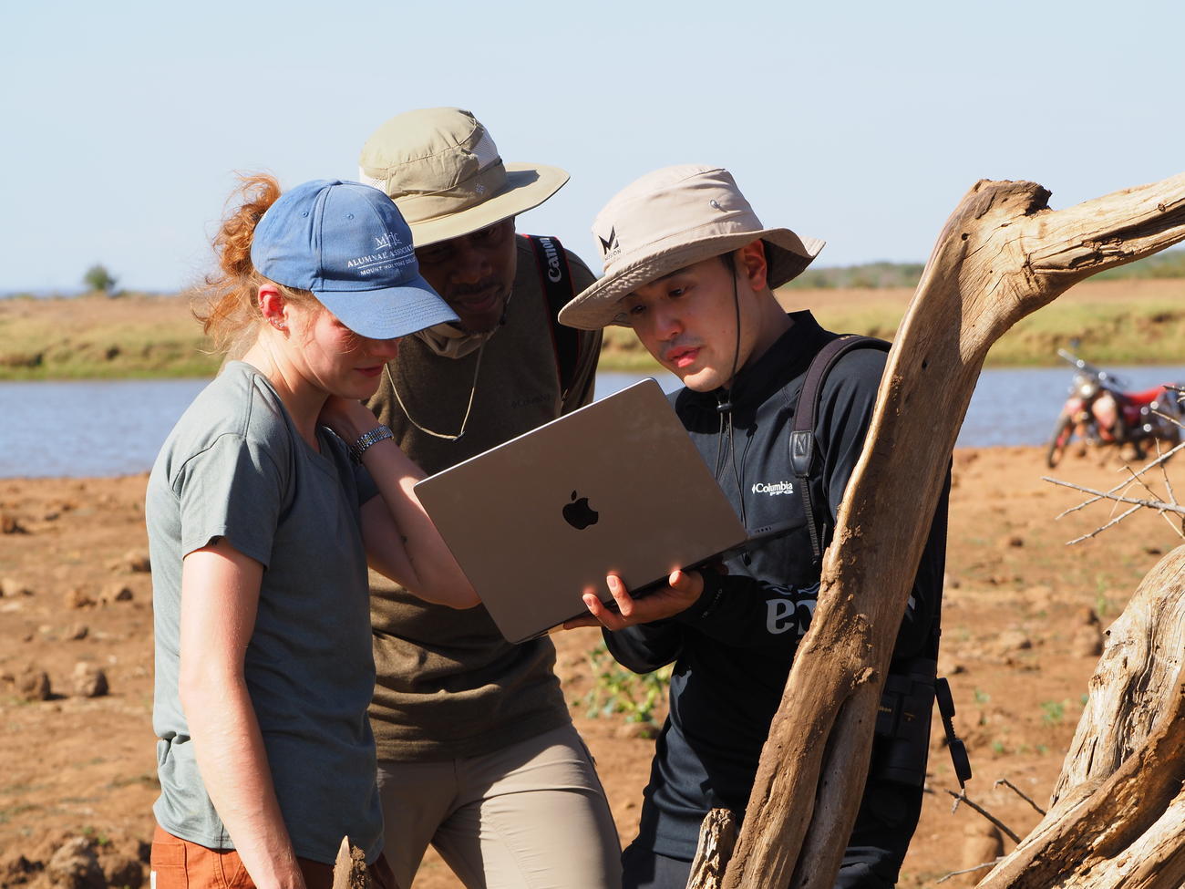 Researchers looking a computer