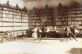 An old photo of a library, circa late 1800s
