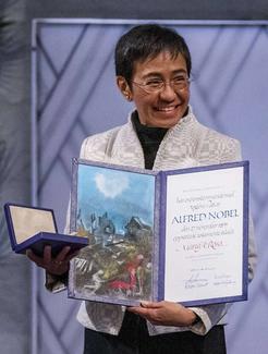 Princeton graduate Maria Ressa receiving her Nobel Peace Prize in Oslo on Dec. 10, 2021.