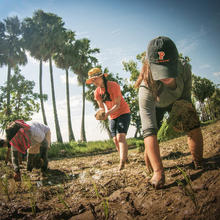A student in a Princeton hat, farms in Indonesia