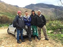 haaqirah Joseph, Mingzhen Lu, Keenan Davids and Lyndall Swarts of the field team pose for a photo in the Jonkershoek nature research of Western Cape, South Africa.