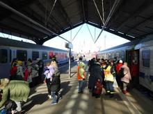 Passengers file calmly into trains waiting to take them further into Germany's mainland. 