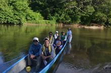 Salama on a canoe on the Magdelina River in Colombia