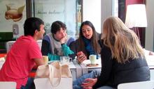 Students sitting around a cafe table from left: Rohan Jinturkar, Sam Kagan, Srishti Ghosh and Abigail Goldberg-Zelizer.