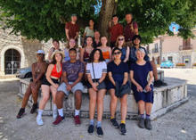 a group of students under a tree