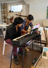 Course participants John Venegas Juarez ’25 and Angela Tan ’22 create music using a Zembalo keyboard.