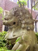 A chinese sculpture depicting a dragon that appears on the south side entrance of Jones Hall