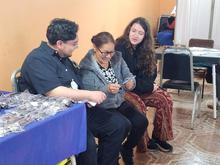 A picture of noel and emily with a woman.
