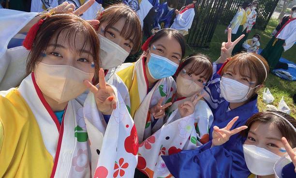 Anne Wen '23 poses for a group photo during a traditional Japanese festival in Osaka