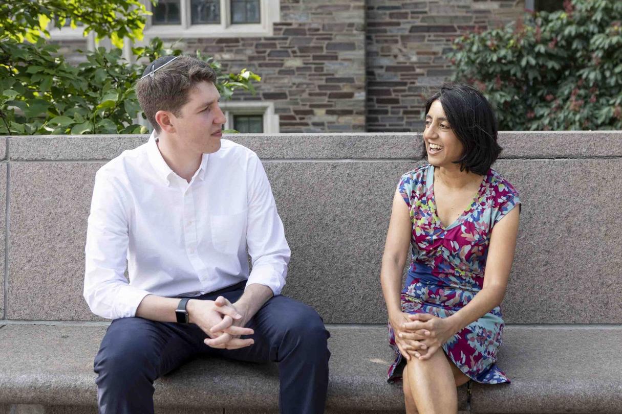 Amichai Feit confers with Professor Seema Jayachandran on the Princeton campus.