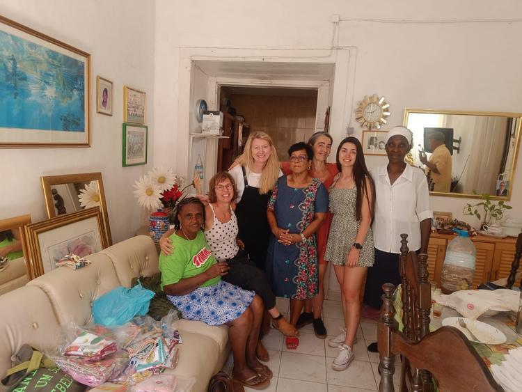 A group shot in the home of a cape verde native