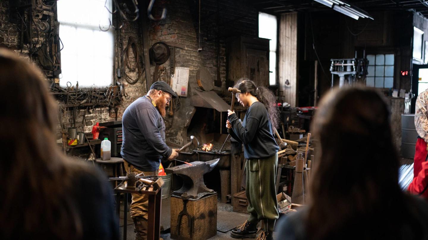 Students work in metalworking facility