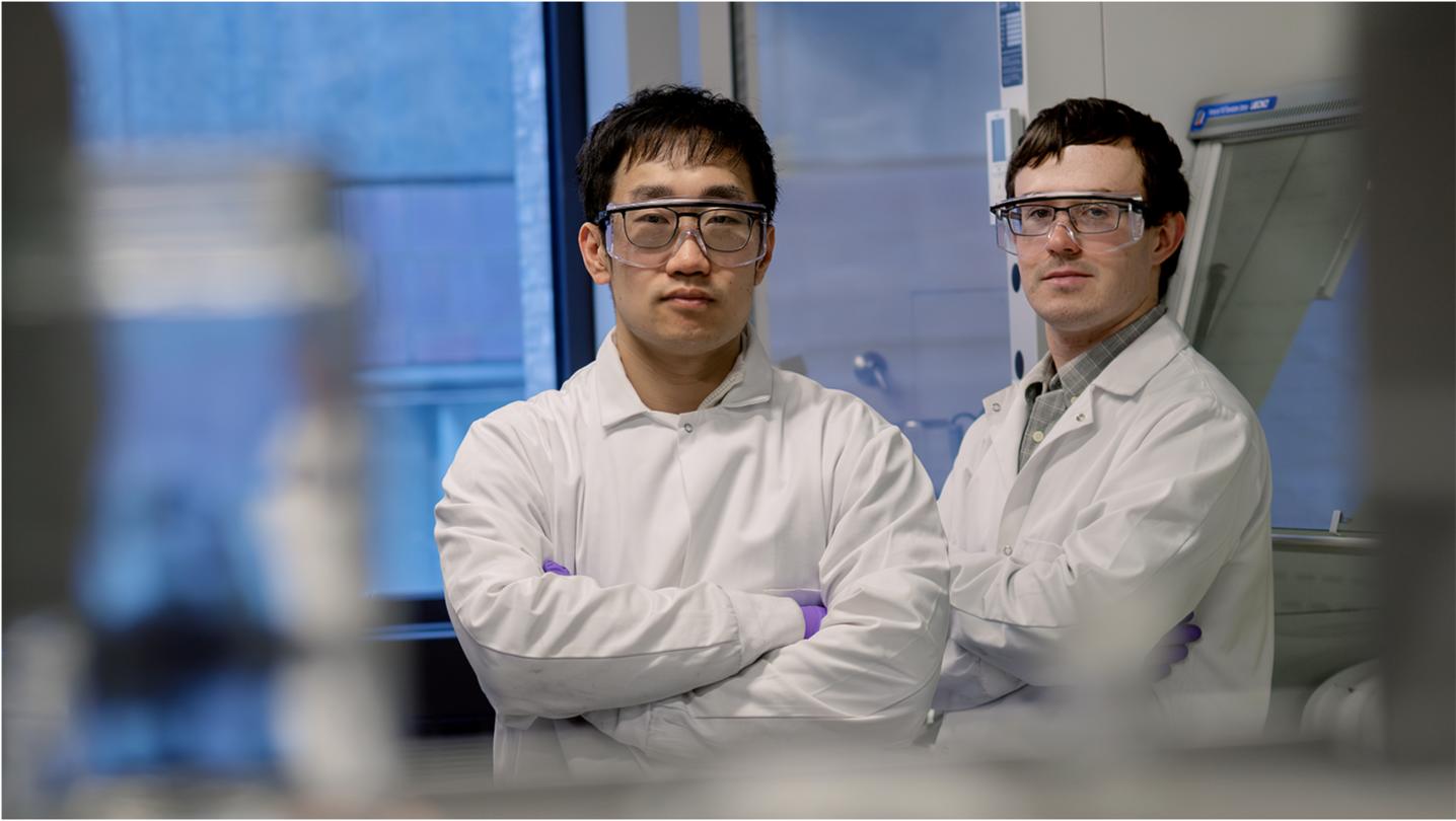 Study authors Yaguang Zhu (left) and Austin Booth stand in Kelsey Hatzell’s lab.