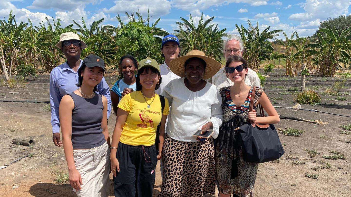 A group of students from Princeton and two African farmers in Botswana