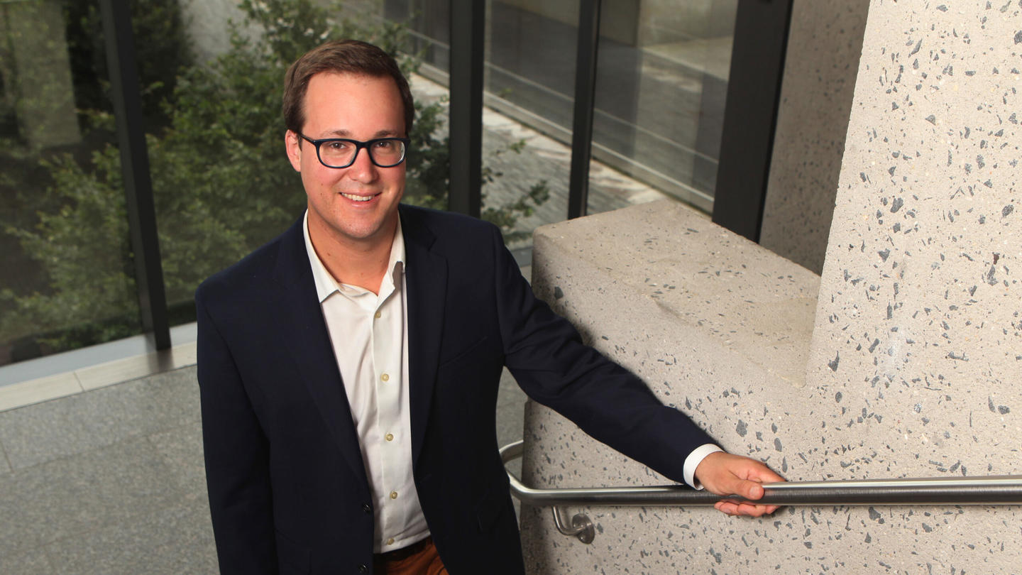 Image of Professor Jenkins smiling on a stairwell