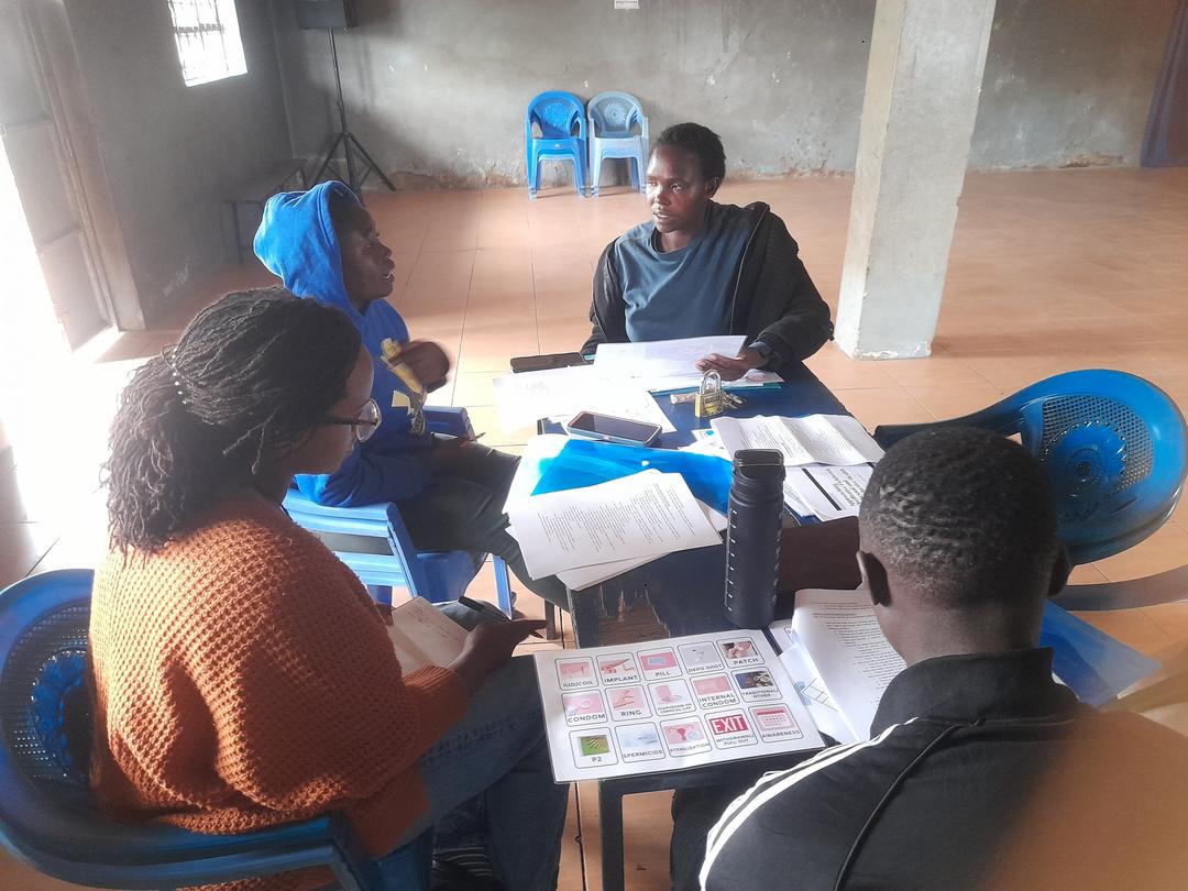 Researchers around a table