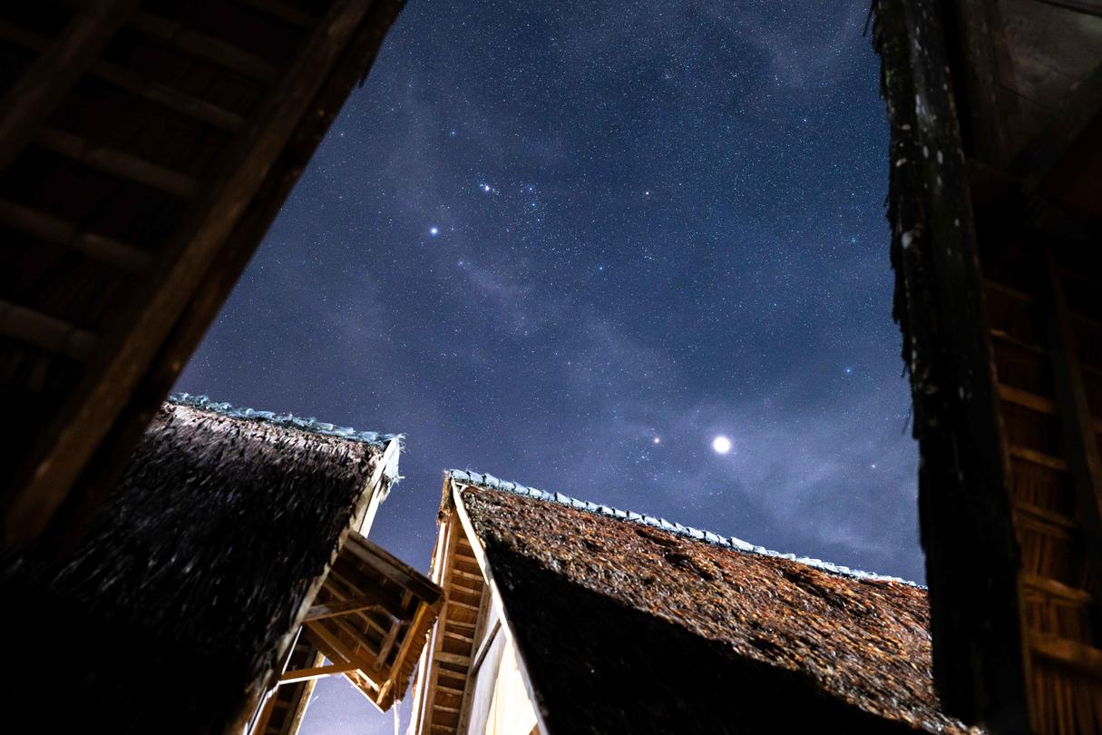 View of the night sky above buildings in Indonesia