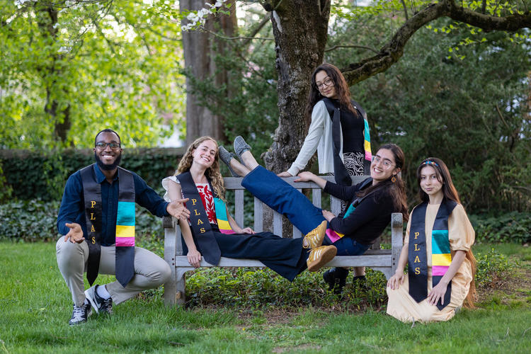 5 program students on a bench