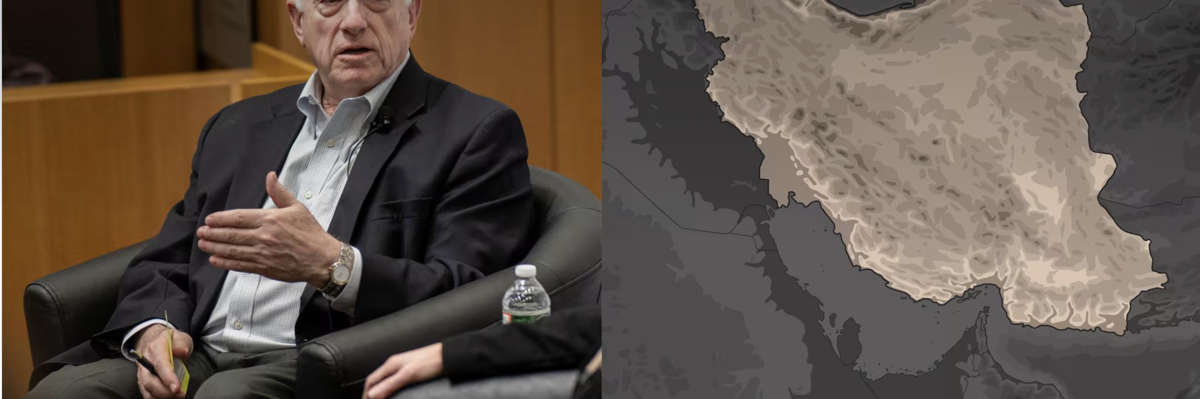 A man sitting and explaining the US-Iranian Crisis