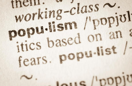 A zoomed in photo of the word Populism in a dictionary