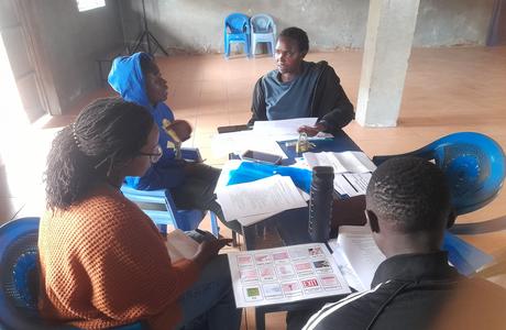 Researchers around a table