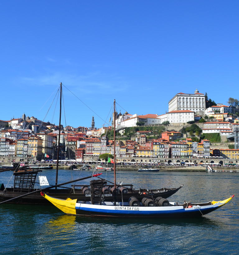 two small boats on a portuguese harbor