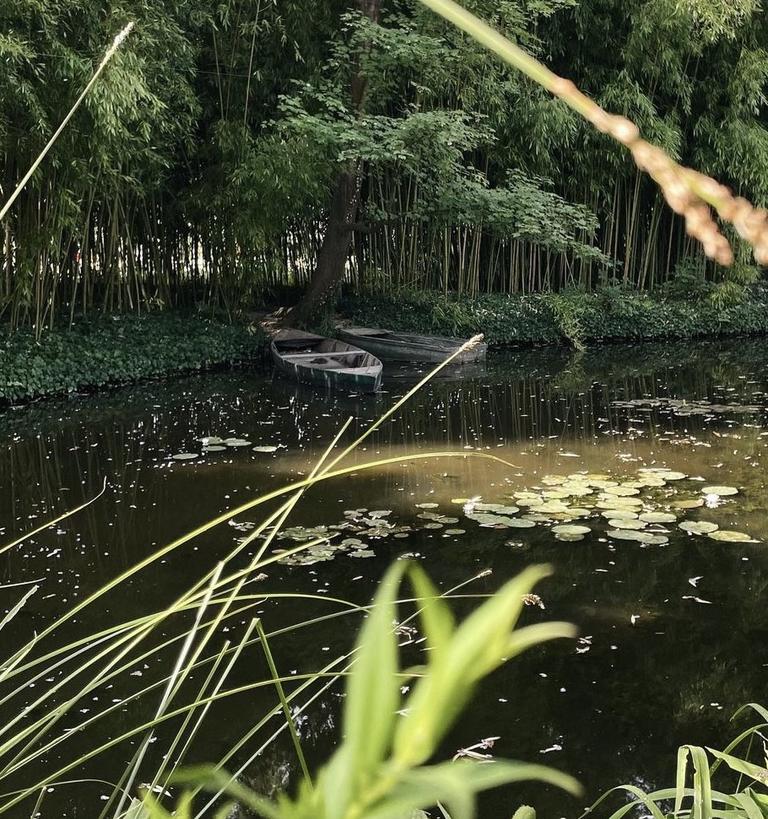 A french creek with a small rowboat